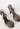 Chanel vintage silver heels with dark silver leather and floral appliqué detail, Fall 2007 - angled view