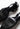 Chanel vintage Camellia heels in black leather - back view