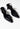 Chanel vintage Camellia heels in black leather - side profile