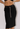 Chanel vintage knee skirt in black wool fabric with CC Chain Belt, 1998 - worn/try-on view