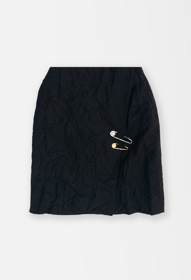 Gianni Versace mini skirt in black crinkled finish wool with mismatched silver and gold safety pin embellishments, 1994 - front view
