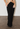 Grace Ling square lower back plate skirt in black with with low side hips and adjustable tie-back straps - worn/try-on view