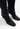 Gucci Tom Ford knee boots in black GG monogram canvas with with leather harness straps, anchored by gold-tone horse bit hardware and fine chain - hardware close-up