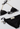 Gucci vintage bikini set in black with a pearl-beaded halterneck strap - angled view