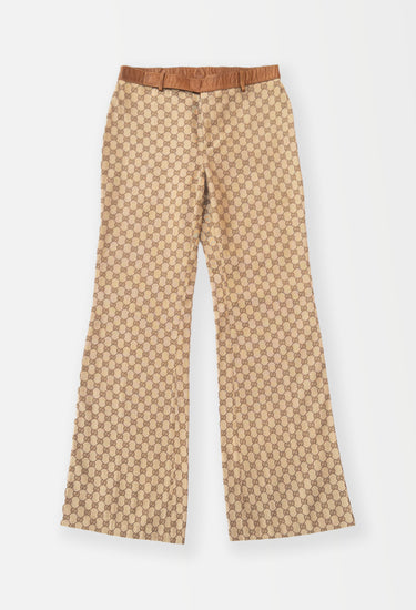 Gucci x Tom Ford trousers in caramel leather trim with GG monogram, F/W 2000 - front view