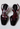 Louis Vuitton vintage plum heels in black patent leather with plum-toned velvet bow accent and gold-tone - front view