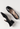 Miu Miu ballet flats in black patent leather with crystals - side profile