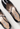 Miu Miu ballet flats in black patent leather with crystals - material/texture close-up