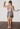 Paco Rabanne mini skirt in shifting silver to soft lilac interlinked metallic discs - worn/try-on view