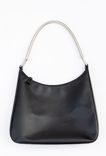Prada oversized handle bag in black leather with silver-tone metal handle - front view