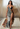 Roberto Cavalli gown in asymmetric cutout tiger fabric, S/S 2022 - worn/try-on view