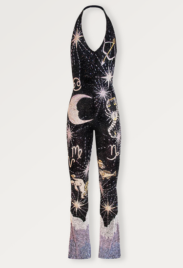 Clio Peppiatt x Annie's Ibiza Celestial jumpsuit in  deep purples, blacks, and stars, all atop a pale lilac cloud with embellished with hand-beaded silver and gold Zodiac imagery - front view