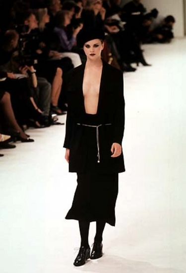 Chanel vintage knee skirt in black wool fabric with CC Chain Belt, 1998 - worn/try-on view