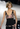 Chanel gown in black crepe with blush-pink beaded draping, 2003 - top view