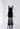 Chanel gown in black crepe with blush-pink beaded draping, 2003 - worn/try-on view