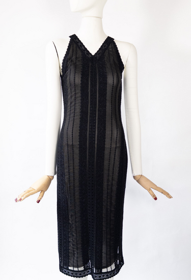 Christian Dior Galliano Era midi dress in sheer black mesh and trimmed with glittering vertical lace panels, 2002 - worn/try-on view
