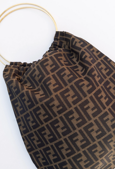 Fendi handle bag in brown and black Zucca motif canvas with gold metal ring handle - pattern/print detail