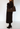 Fendi shoulder bag in black and brown monogram canvas with leather strap, 2000s - worn/try-on view