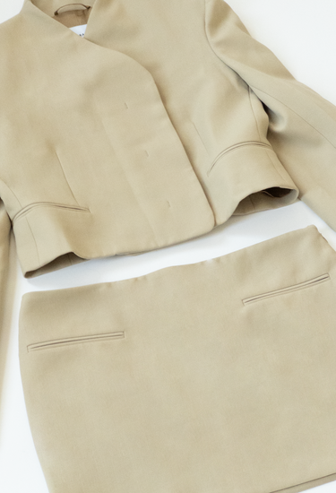 Ferragamo mini skirt suit in beige, Spring/Summer 2023 - material/texture close-up