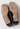 Gucci vintage low heel pumps in black leather with gold-tone horsebit hardware - back view
