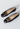Gucci vintage low heel pumps in black leather with gold-tone horsebit hardware - angled view