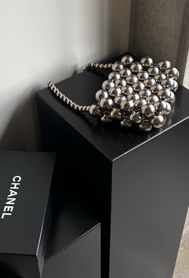 Jil Sander handbag in silver spheres with beaded shoulder strap - angled view