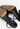 Louis Vuitton heels in black patent leather with miniature gold-tone LV cube charms - back view