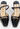 Louis Vuitton heels in black patent leather with miniature gold-tone LV cube charms - front view