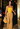 Miu Miu cropped bandana top in mustard-hued leather, 2024 - worn/try-on view