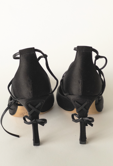 Christian Dior vintage bow satin heels in black leather - back view