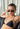 Prada vintage rimless sunglasses in dark bottle green oval lenses with with sculptural silver-tone arms with "CC" hardware - worn/try-on view