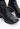 Prada vintage split sole boots in black leather, 1999 - material/texture close-up